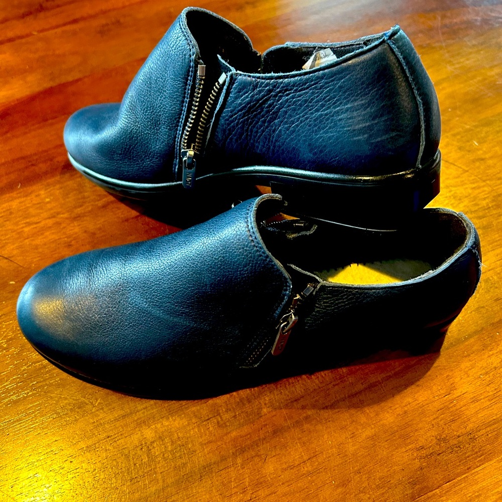 Beautiful Naot ankle boots. Worn once. Double zipper allows easy on and off.